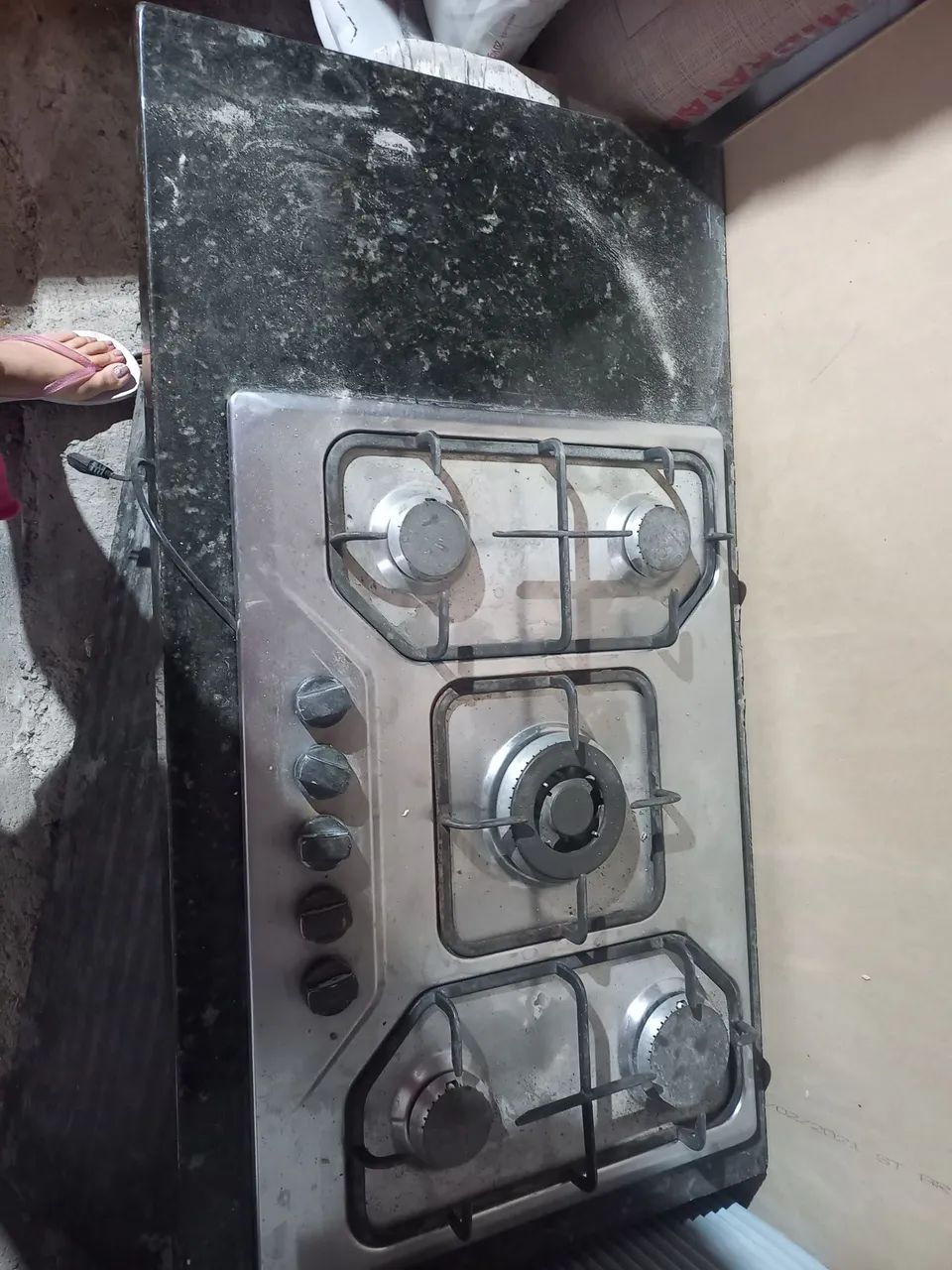 Bancada de mármore com fogao