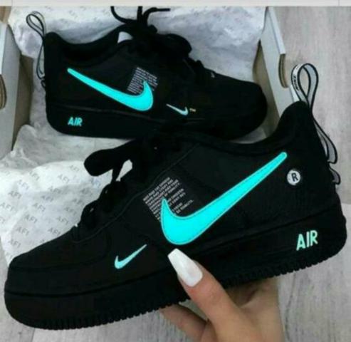 tenis nike preto e verde