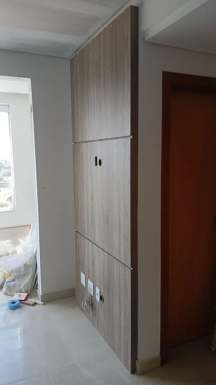 Panel with attached table and panel plus low cabinet with 03 drawers.64311791014531124