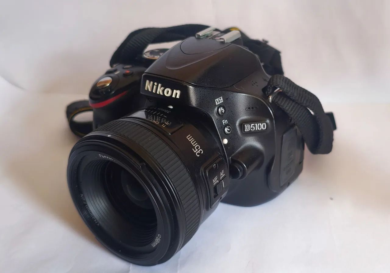 Nikon D5100 + lente 35mm e acessórios  - Foto 2