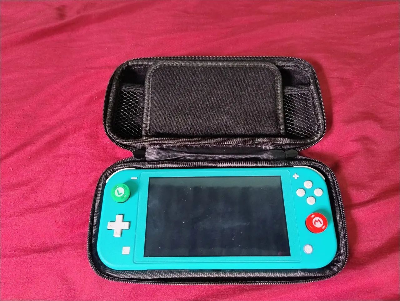 Vendo Nintendo Switch lite turquesa 