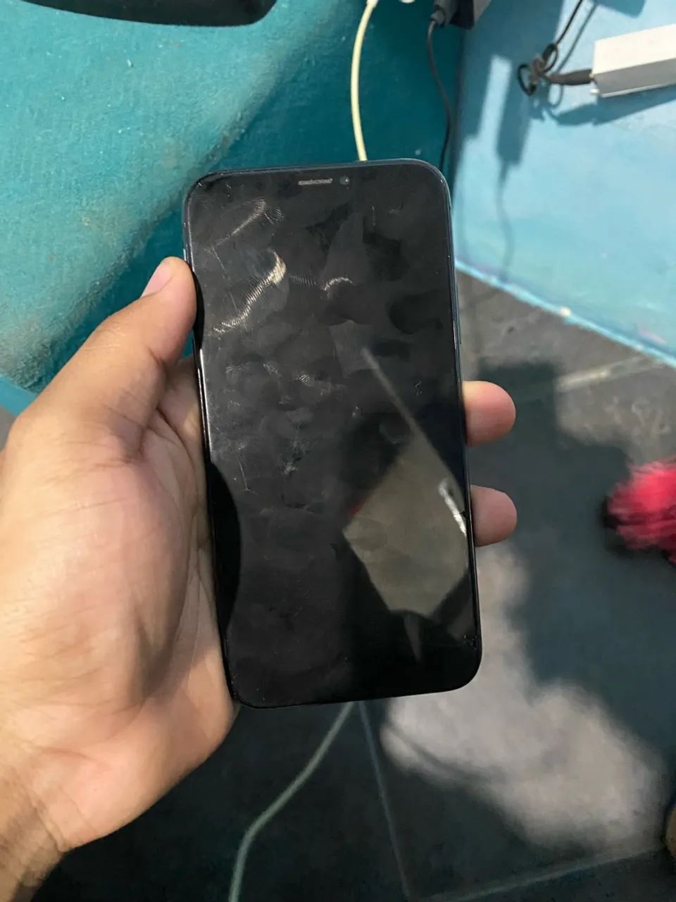 iPhone X retirada de peça 