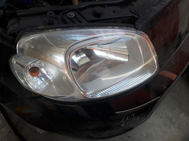 Farol Fiat uno 2011