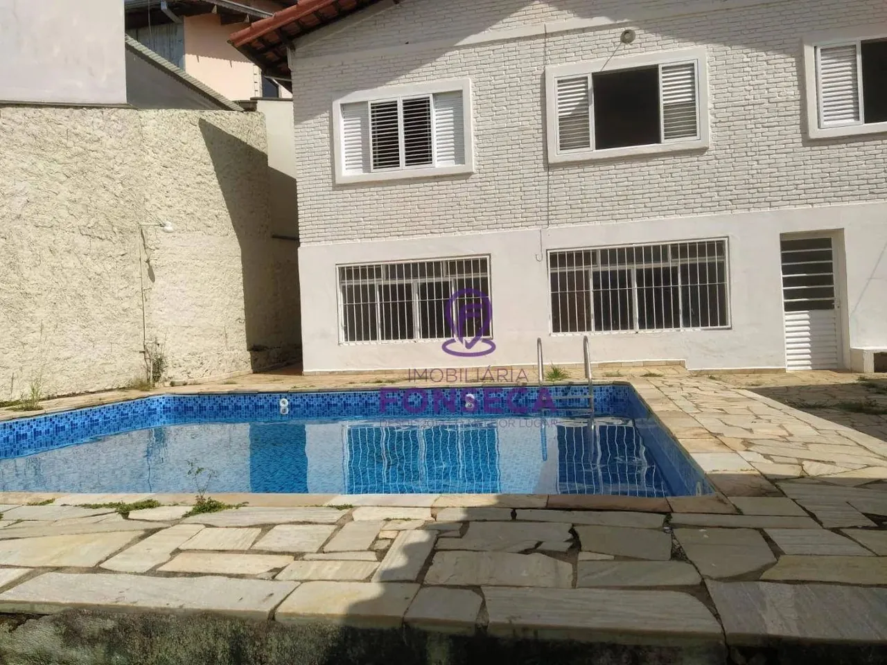 Casa com 3 dormitórios para alugar, 253 m² por R$ 3.300,00/mês - Jardim Santa Eliza - Pous
