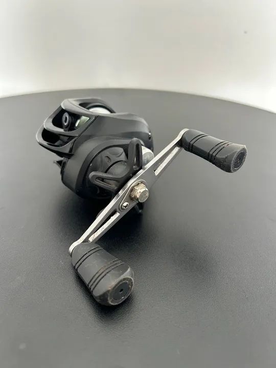 Carretilha top fishing + carretel cheio de linha multifilamento X4