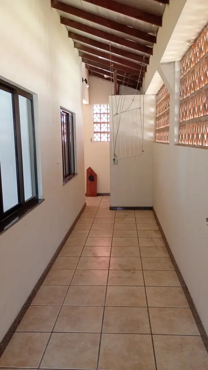 Sobrado com suite c/closet, sacadas, ar cond/armários/jardim e area comercial - Foto 2