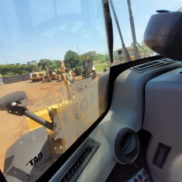 Vendo ou troco pá carregadeira 914k - Foto 3