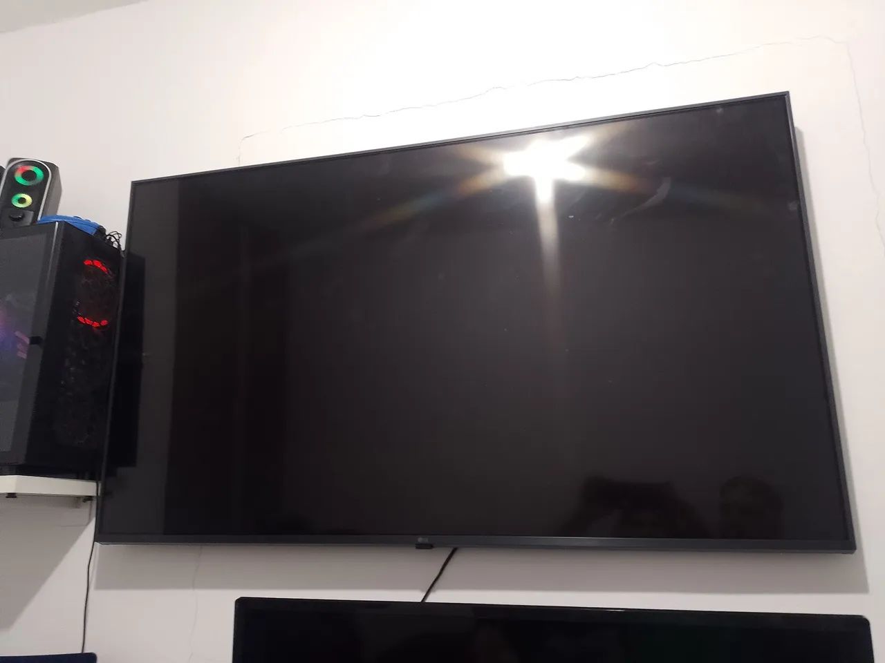 Tv 55  com defeito 