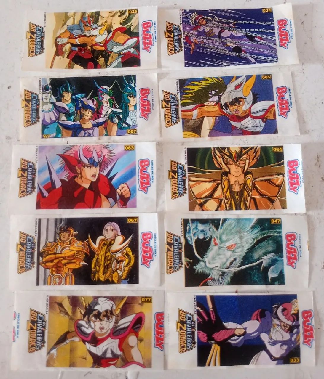 Figurinhas Álbum Buzzy Cavaleiros do Zodíaco  - Foto 2