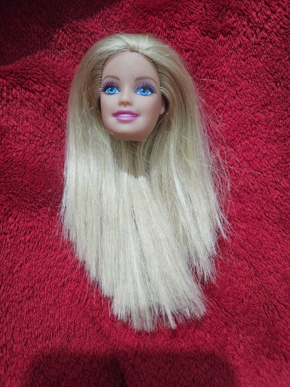 Cabeça de boneca barbie