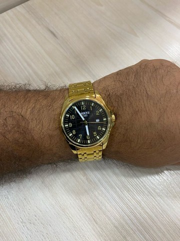 Relógio original importado Marca Nibosi em aço inox Gold 