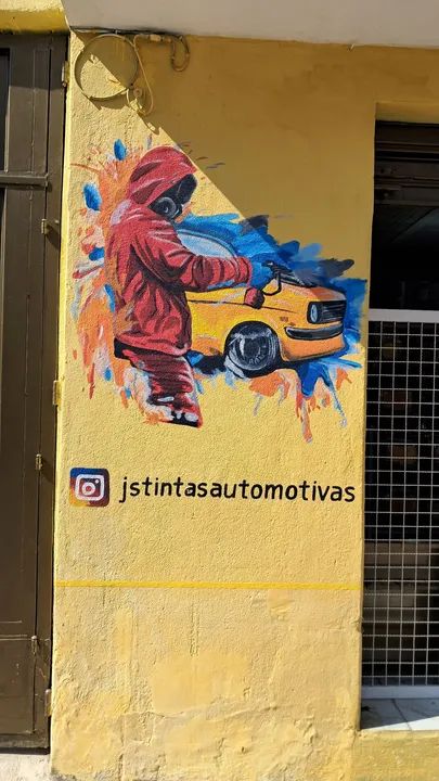 Letreiros e pintura artística em parede