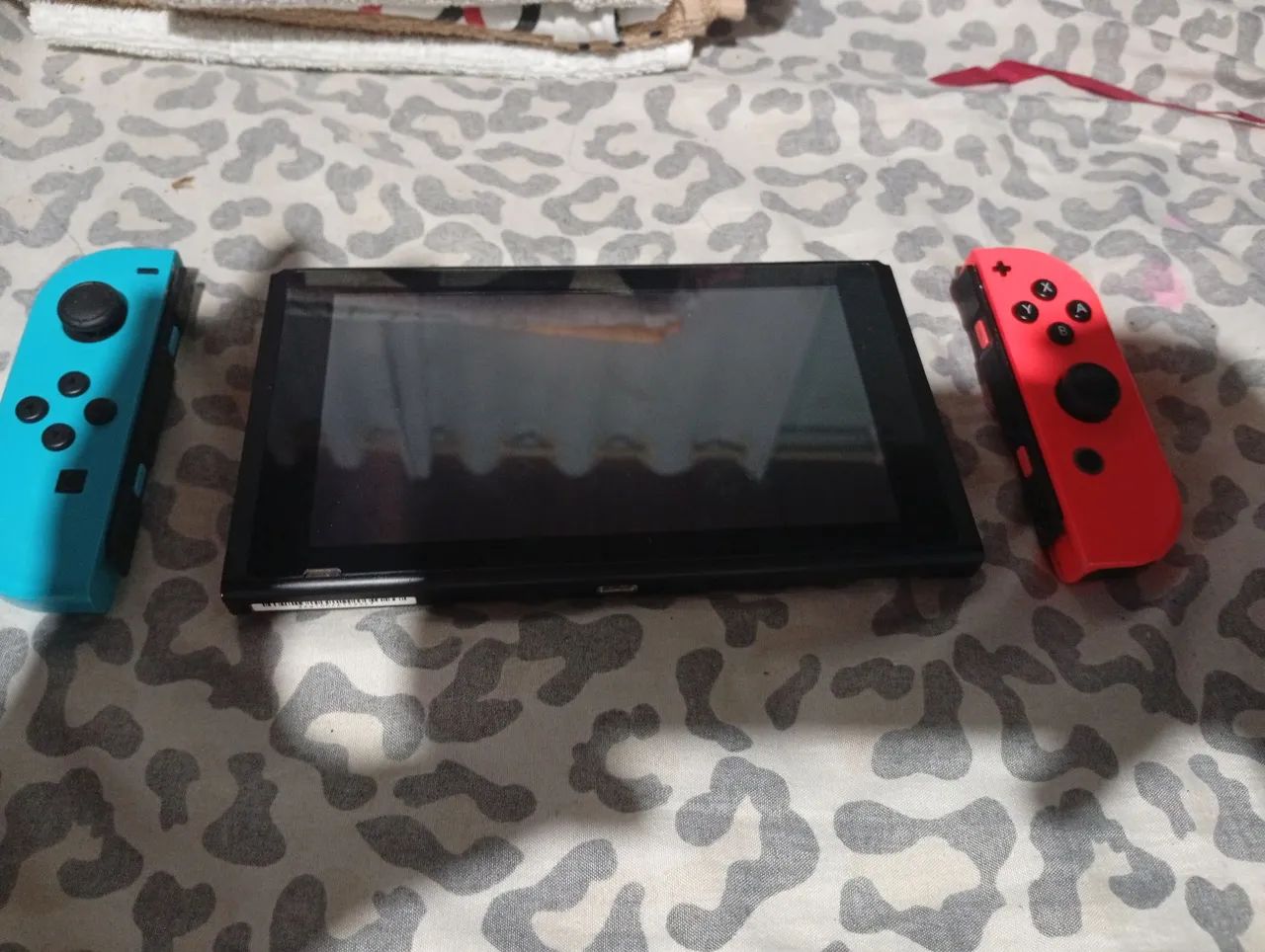 Nintendo Switch - Azul e Vermelho - Foto 4
