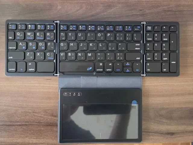 Teclado bluetooth portátil com touchpad