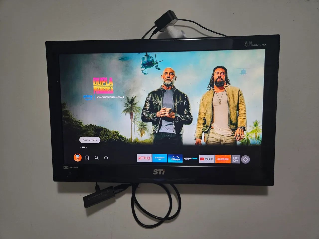 Fire stick TV + Televisão  - Foto 2