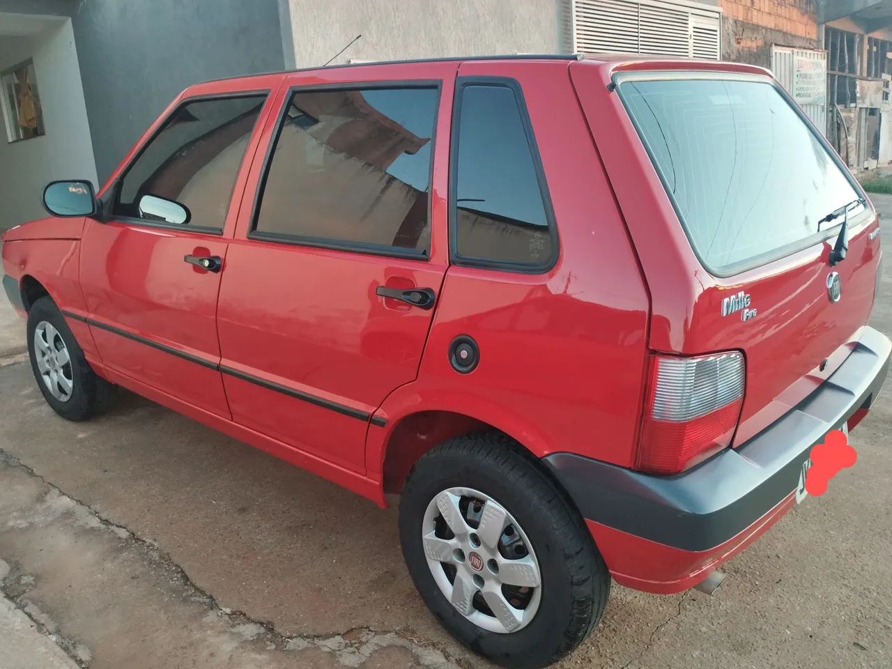 Uno 2013 completo de fabrica relíquia com ar condicionado e direção hidráulica 