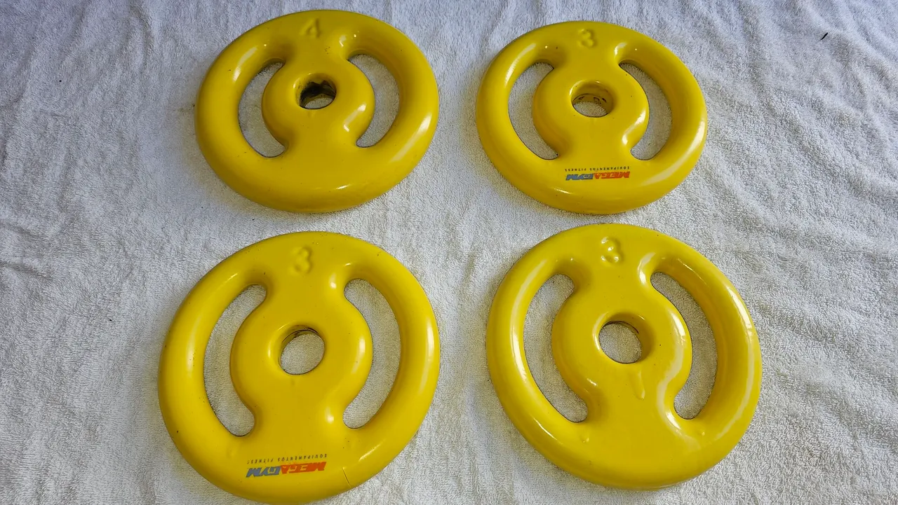 Kit com 4 anilhas emborrachadas 1 com 4kg 3 com 3kg cada