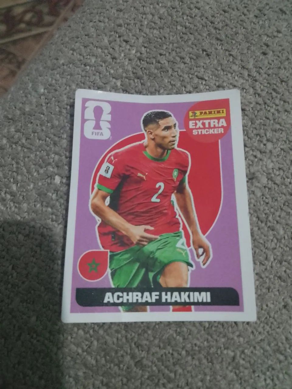 Figurinha extra sticker Hakimi bordo/bronze