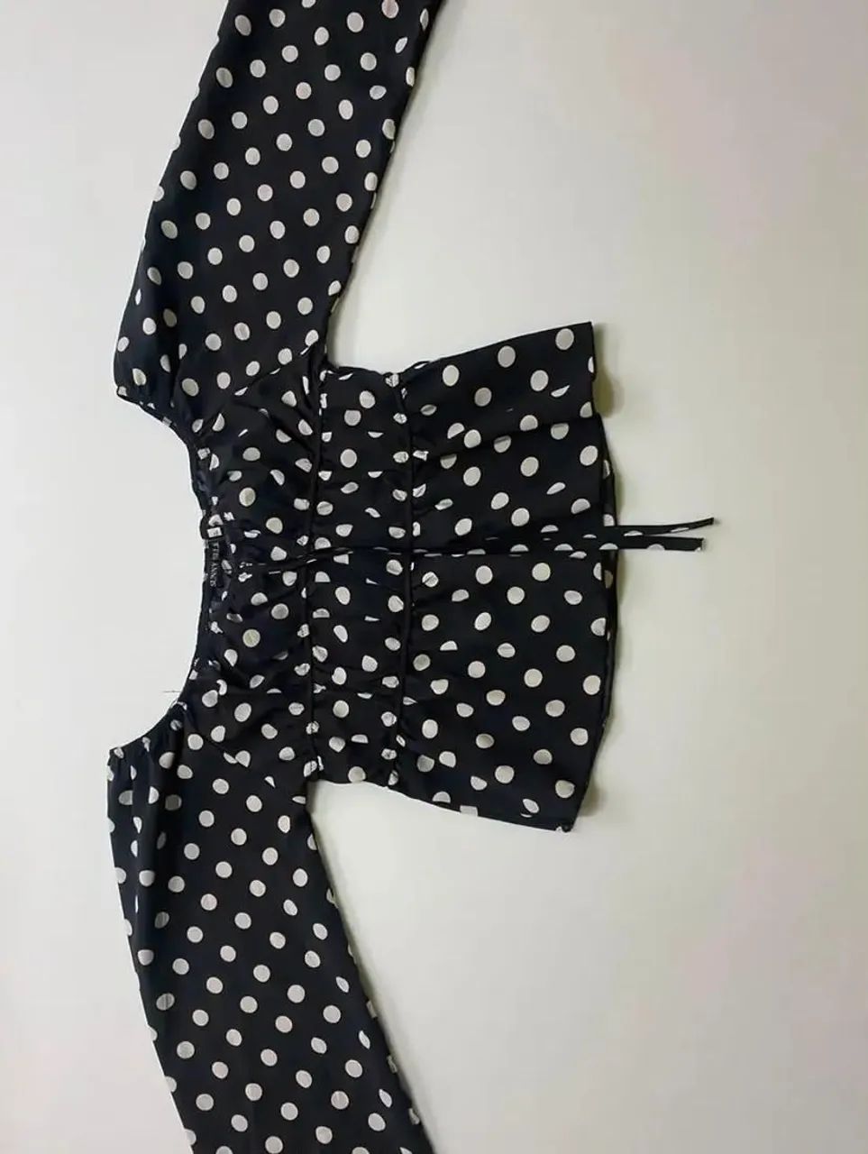 Blusa de bolinhas com manga