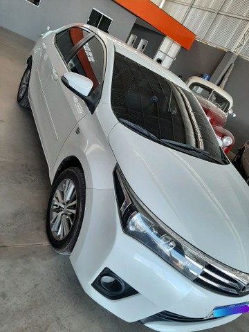 COROLA XEI 2015 EXTRA DISPONÍVEL ?