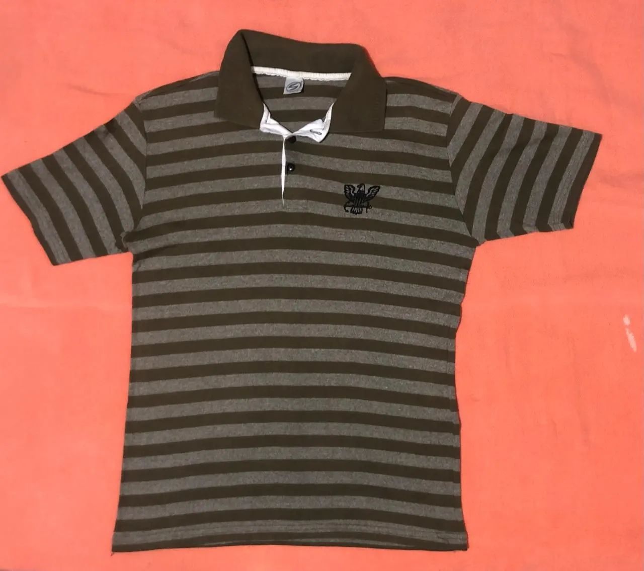 Camisa polo , semi nova .