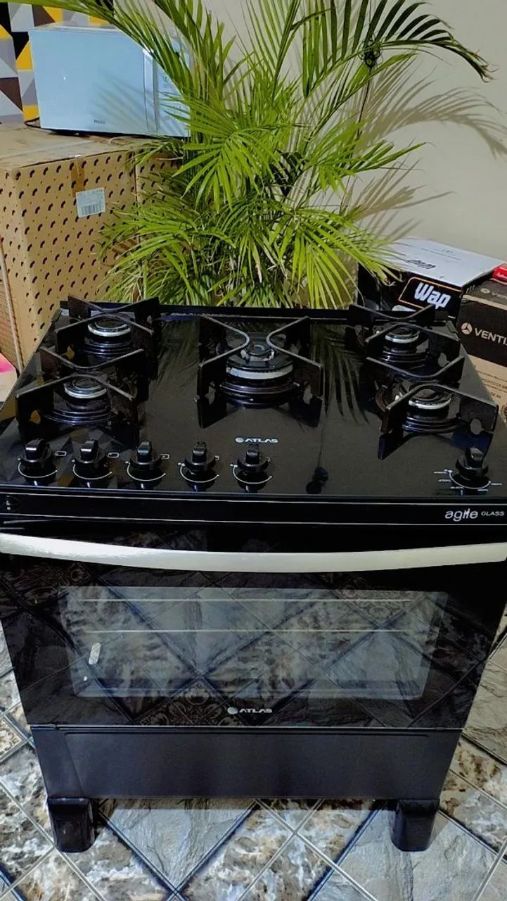 Fogão Atlas 5 bocas de vidro funcionando perfeitamente muito lindo .