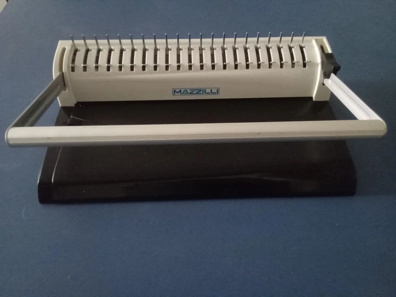 Encadernadora.<br>120,00