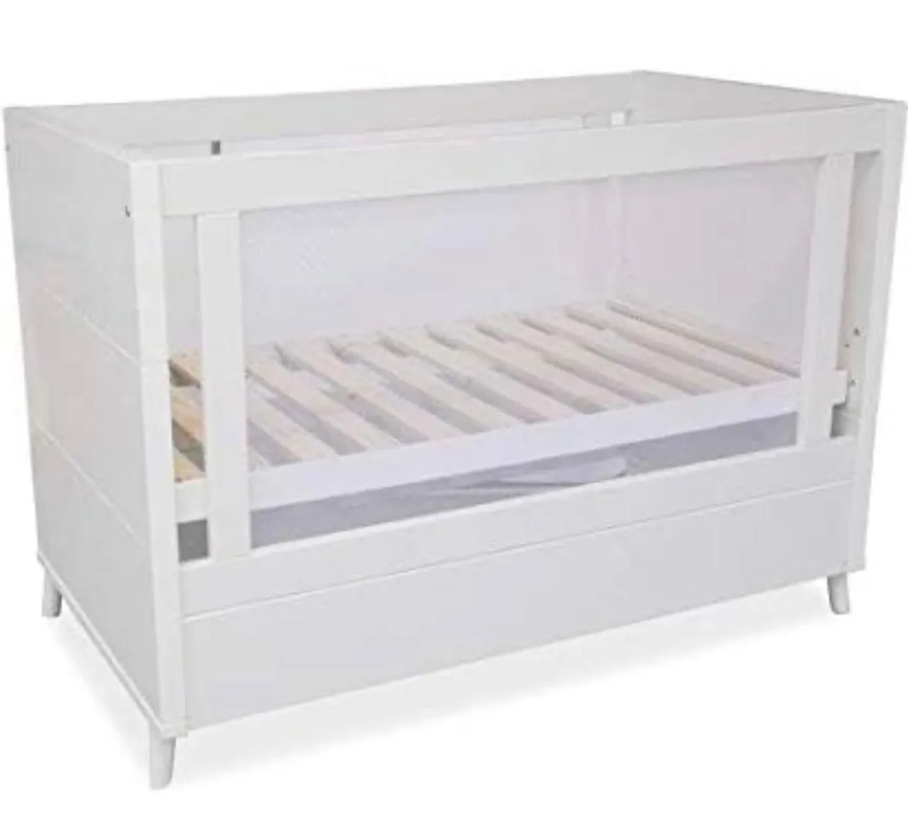 New baby crib with mesh side, brand-new and already packaged.