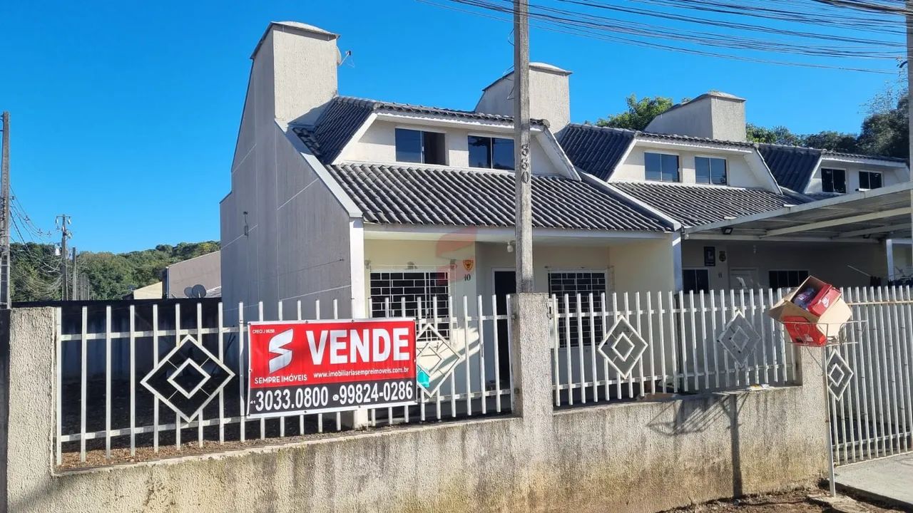 CASA COM ÁTICO