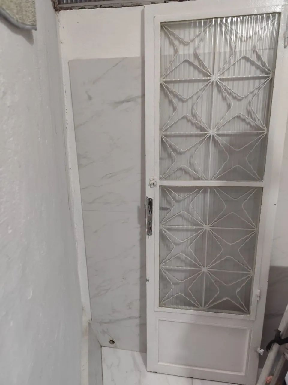 Iron door with fluted glass