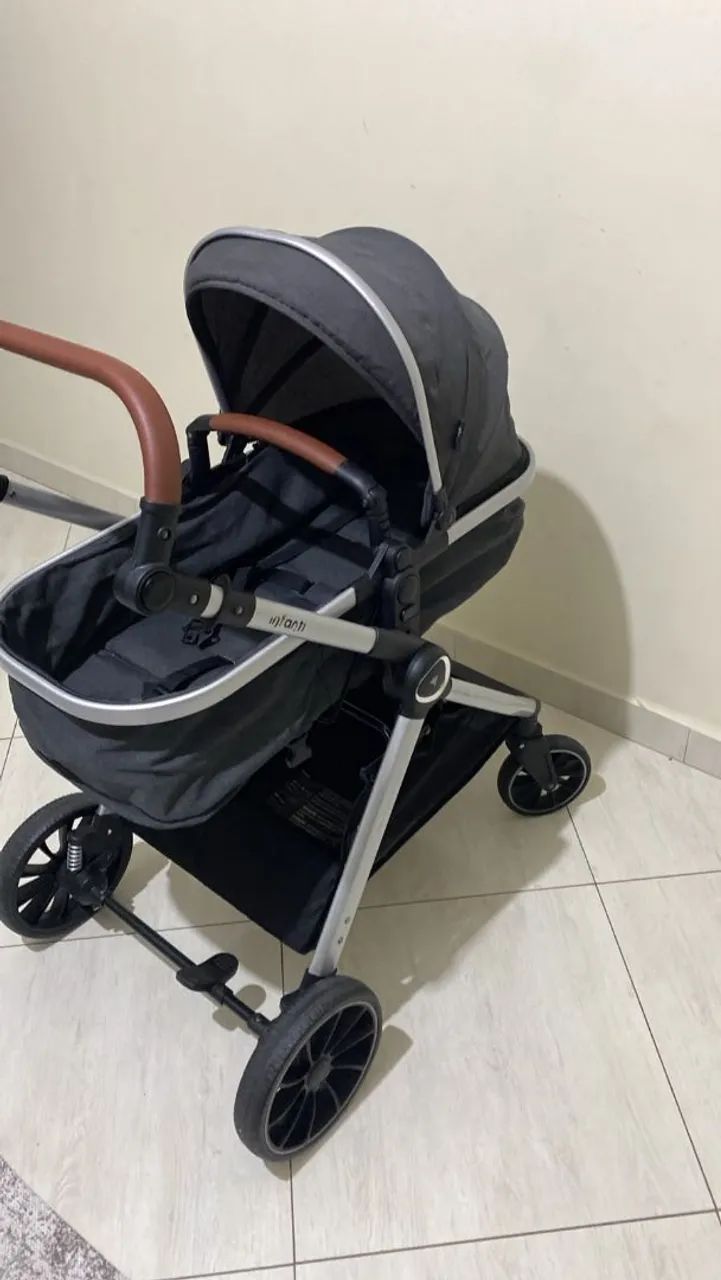 Carrinho Roman Zion com Bebe Conforto