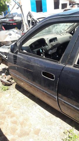 Porta dianteira esquerda toyota corolla xei 2000