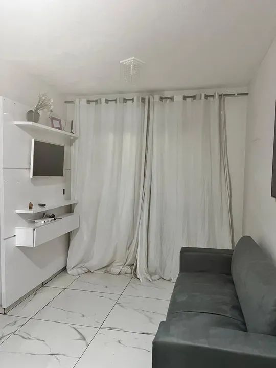 Apartamento moderno com varanda em condomínio completo