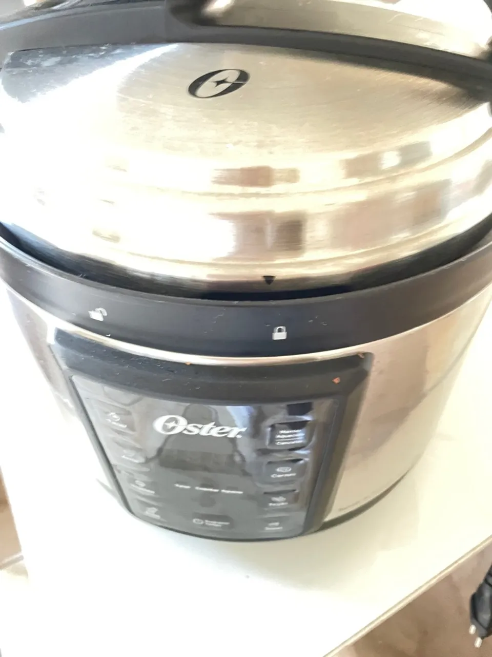 Panela de pressão elétrica Oster