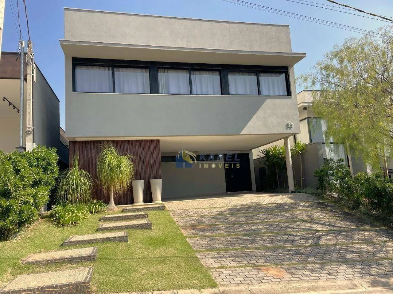 SOBRADO para VENDA ou LOCAÇÃO com 3 Suítes, Área Gourmet Integrada, Quintal com Jardim e J