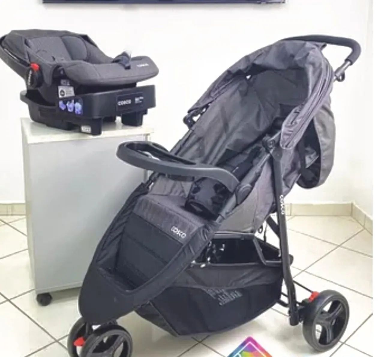 Carrinho + bebê conforto ( semi novo)