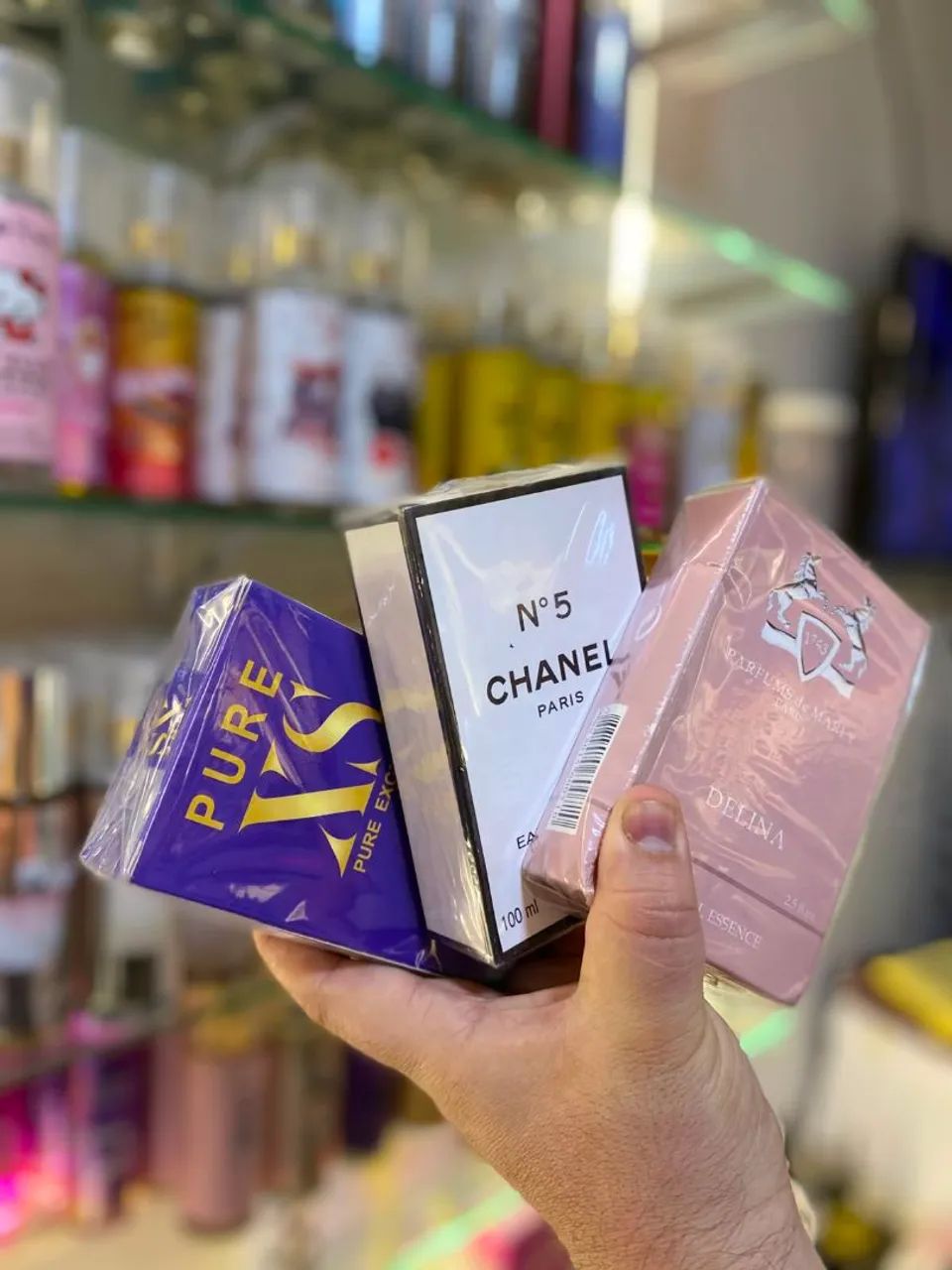 perfumes 3 por 100$