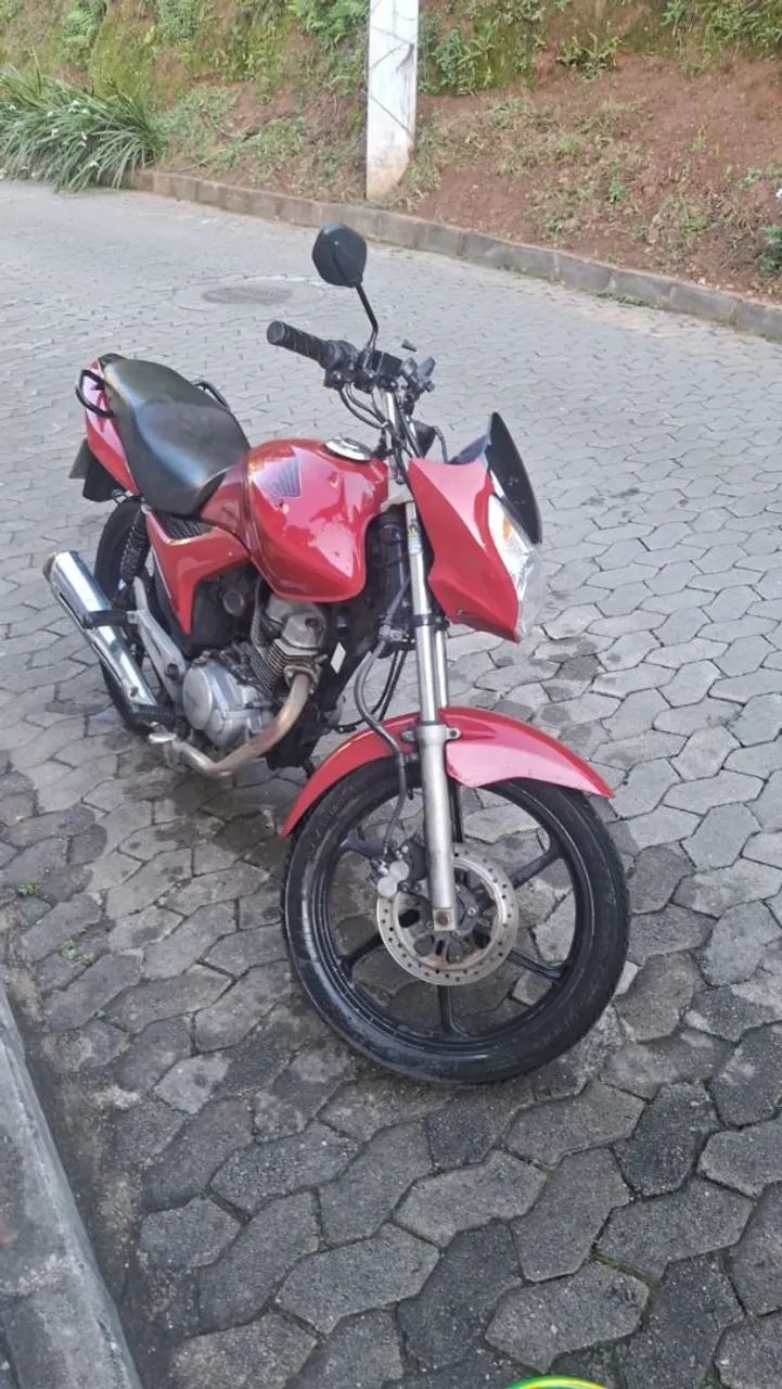 Moto em otimo estado