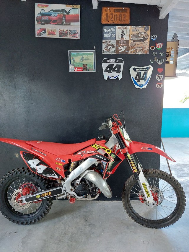 Cr 125 toda restaurada moto extra pr pessoas exigente,aceito troca em outras motos! 