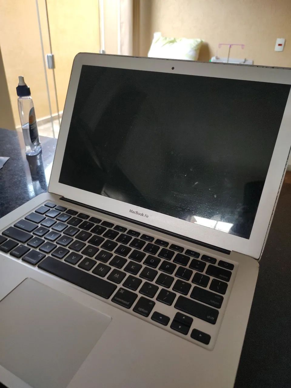 MacBook Air notebook without charger, untested64308004824578125