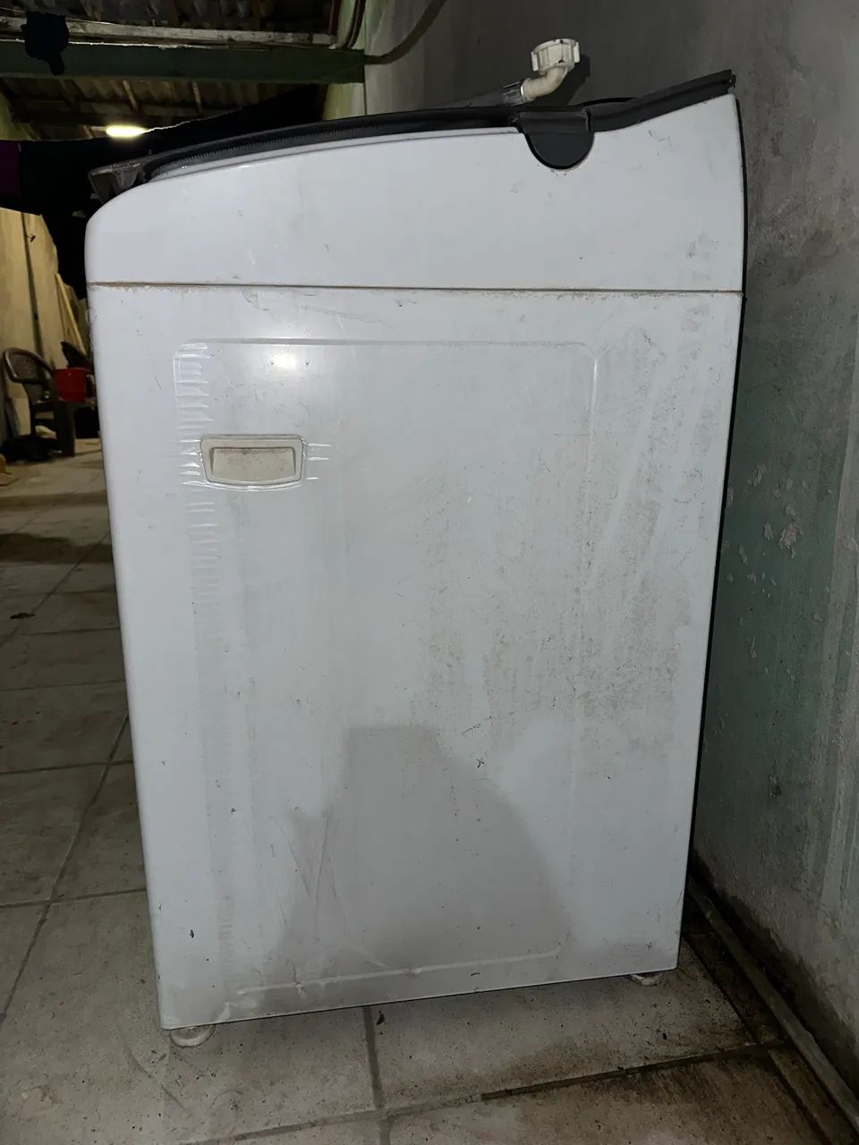 Máquina de lavar com defeito 