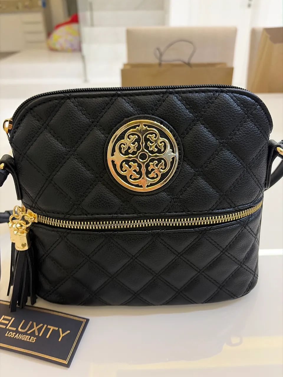 Bolsa transversal em couro preta nova comprada nos eua 