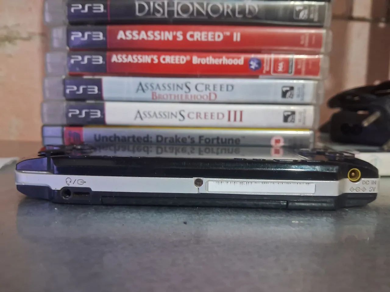 PSP COM DEFEITO COM CARREGADOR  - Foto 4