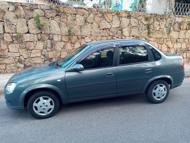 VENDO CORSA 2013 OU TROCO POR TERRENO