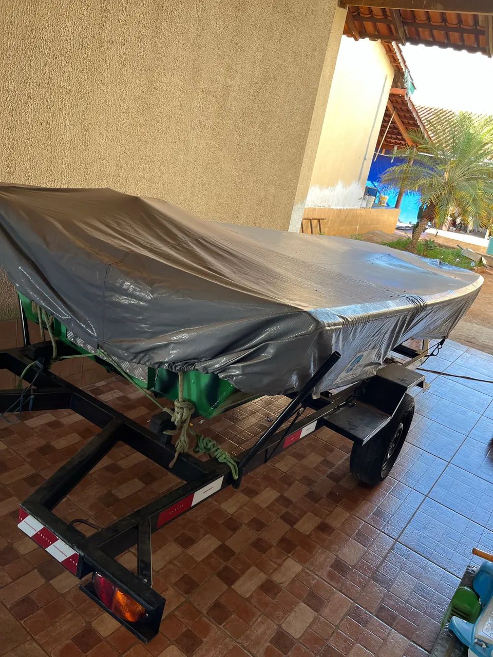 Canoa berço e motor rabeta 7hp - Foto 3