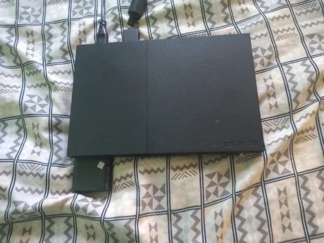 Vendo Playstation 2 com vários jogos por apenas 250