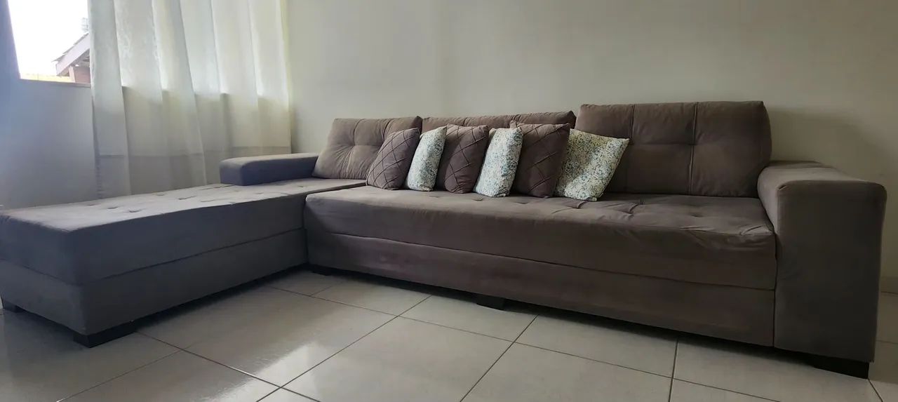 Sofá e almofadas (o puff não). 439340409784913920