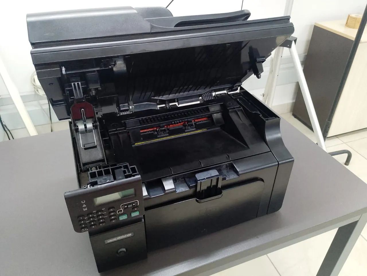 Impressora HP LaserJet Pro M1212NF 