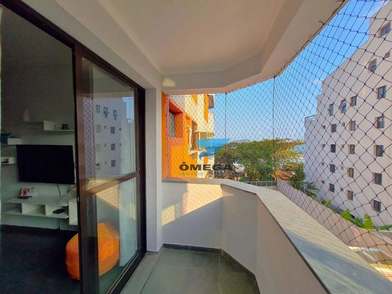 Apartamento à venda na praia do Tombo em Guarujá | Omega Imóveis