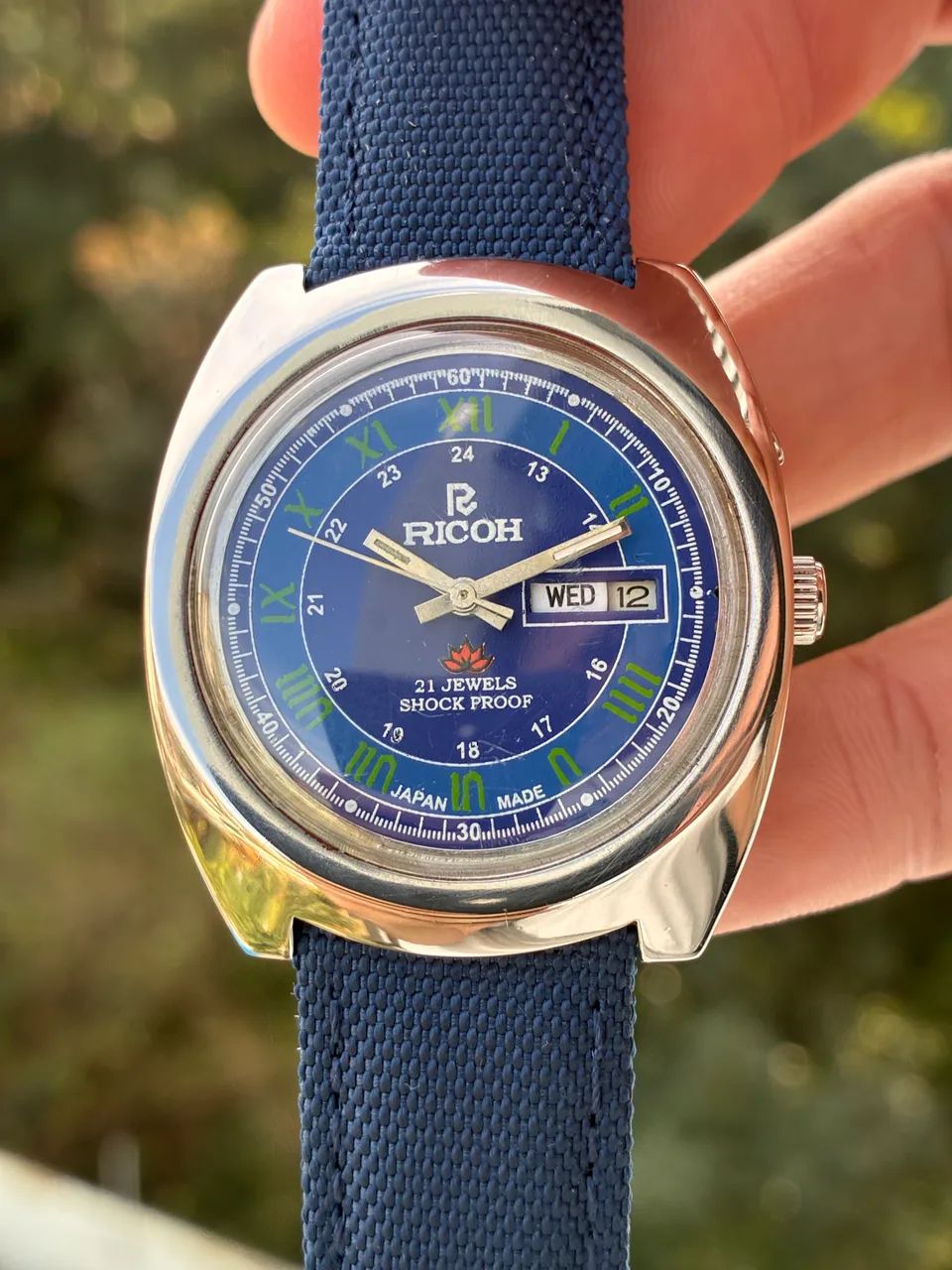 Relógio vintage Ricoh azul